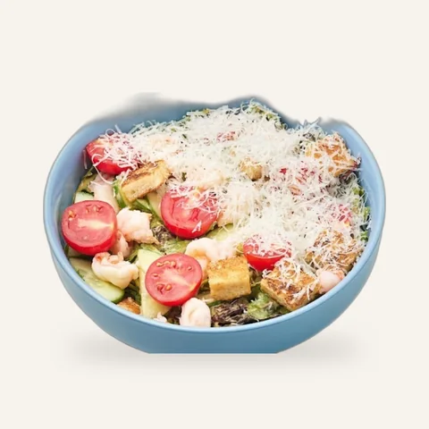 Caesar salad in a blue bowl