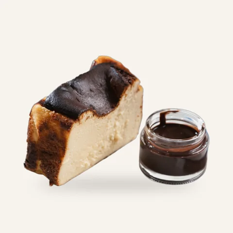 San Sebastián cheesecake with chocolate sauce