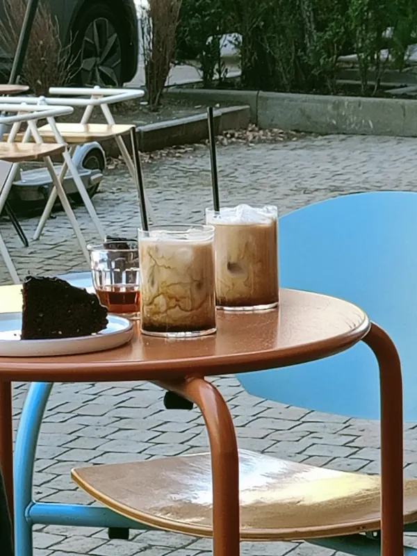 Iced coffees on a terrace table